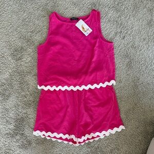 Pink and white top and shorts